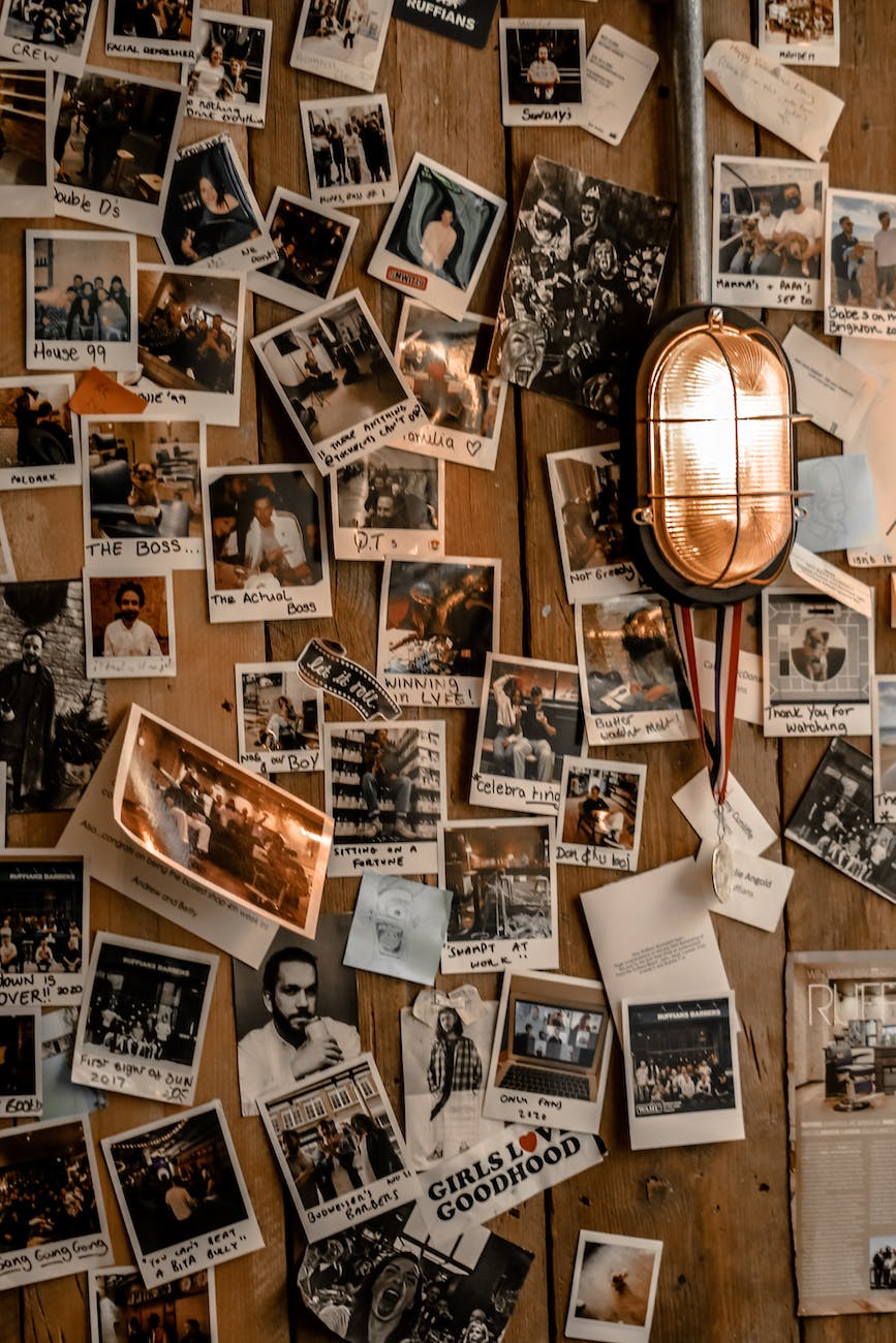 wooden wall with printed photographs